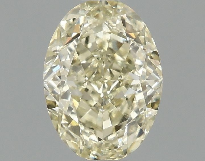 IGI Oval 1.09ct Fancy Yellow VVS2 Loose Lab Diamond: IGI Oval 1.09ct Fancy Yellow VVS2 Loose Lab Diamond Experience the unique beauty of a Fancy Yellow diamond, one of the rarest and most coveted colors in nature. This 1.09ct IGI-certified lab-grown gem