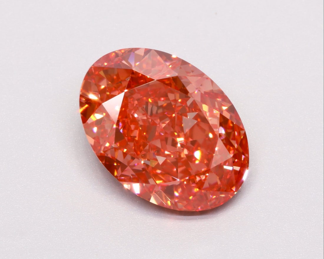 IGI Oval 10.53ct Fancy Vivid Pink VVS2 Loose Lab Diamond: IGI Oval 10.53ct Fancy Vivid Pink VVS2 Loose Lab Diamond Experience the rare beauty of a Fancy Vivid Pink diamond, one of the most coveted colors in the world of gemstones. This stunning 10.53ct IGI-c