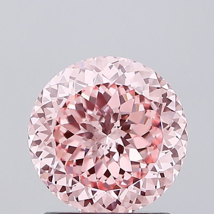 IGI Round 1.59ct Fancy Vivid Pink VVS2 Loose Lab Diamond: IGI Round 1.59ct Fancy Vivid Pink VVS2 Loose Lab Diamond Experience the breathtaking beauty of this 1.59ct Fancy Vivid Pink VVS2 loose lab diamond, certified by IGI and showcasing exceptional clarity,