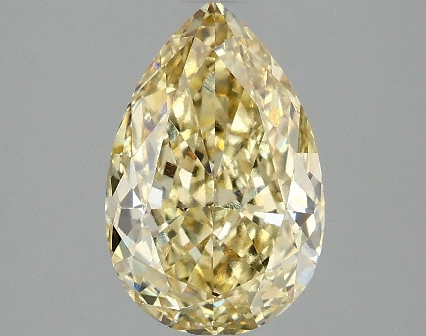 Loose Lab Diamond - IGI Pear 2.1ct Fancy Intense Yellow VVS2: Loose Lab Diamond - IGI Pear 2.1ct Fancy Intense Yellow VVS2 A rare and vibrant Fancy Intense Yellow lab diamond, certified by the International Gemological Institute (IGI), boasts exceptional clarity