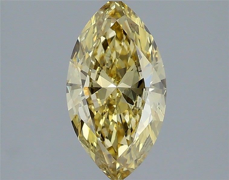 IGI Marquise 1.29ct Fancy Intense Yellow VVS2 Loose Lab Diamond: IGI Marquise 1.29ct Fancy Intense Yellow VVS2 Loose Lab Diamond Experience the vibrant beauty of nature in this stunning 1.29ct Fancy Intense Yellow VVS2 lab-grown diamond, boasting exceptional clarit