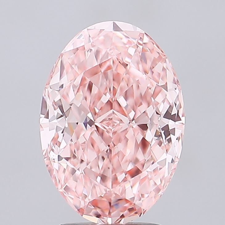 IGI Oval 3.13ct Fancy Vivid Pink VVS2 Loose Lab Diamond: IGI Oval 3.13ct Fancy Vivid Pink VVS2 Loose Lab Diamond Experience the rare beauty of a Fancy Vivid Pink diamond, one of the most coveted colors in the world of gemstones. This exquisite 3.13ct lab-gr