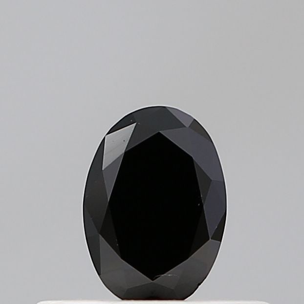 Loose Lab Diamond - Oval 0.26ct Black VVS2: Loose Lab Diamond - Oval 0.26ct Black VVS2 A rare and striking oval-cut lab diamond, certified VVS2 clarity, boasts an exceptional polish and symmetry, giving it a luxurious appearance. Its sleek blac