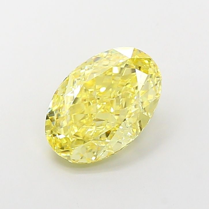 IGI Oval 3.26ct Fancy Vivid Yellow VVS2 Loose Lab Diamond: IGI Oval 3.26ct Fancy Vivid Yellow VVS2 Loose Lab Diamond Experience the vibrant beauty of nature in the IGI Oval 3.26ct Fancy Vivid Yellow VVS2 Loose Lab Diamond, a rare and exceptional gemstone grow