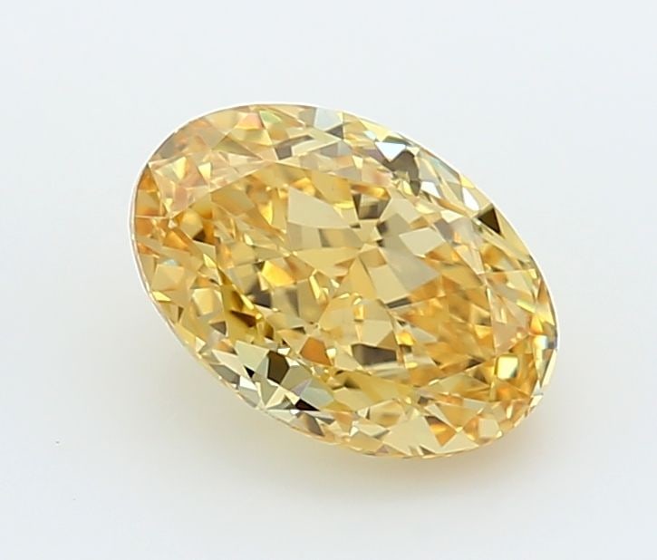 IGI Oval 1.55ct Fancy Vivid Yellow VVS2 Loose Lab Diamond: IGI Oval 1.55ct Fancy Vivid Yellow VVS2 Loose Lab Diamond Experience the vibrant beauty of nature in this stunning 1.55ct Fancy Vivid Yellow VVS2 lab-grown diamond, certified by the International Gemo