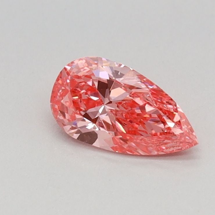 Loose Lab Diamond - IGI Pear 0.32ct Fancy Vivid Pink VVS2: Loose Lab Diamond - IGI Pear 0.32ct Fancy Vivid Pink VVS2 This stunning loose lab diamond boasts an exceptional 0.32 carat Fancy Vivid Pink color, showcasing a rare and vibrant hue that's sure to turn