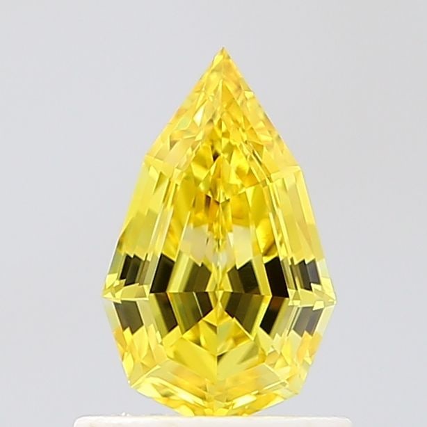 Loose Lab Diamond - IGI Pear 0.72ct Fancy Vivid Yellow VVS1: Loose Lab Diamond - IGI Pear 0.72ct Fancy Vivid Yellow VVS1 A rare and radiant gem, this 0.72ct IGI-certified lab diamond boasts an exceptionally vibrant Fancy Vivid Yellow color, rivaling the brighte
