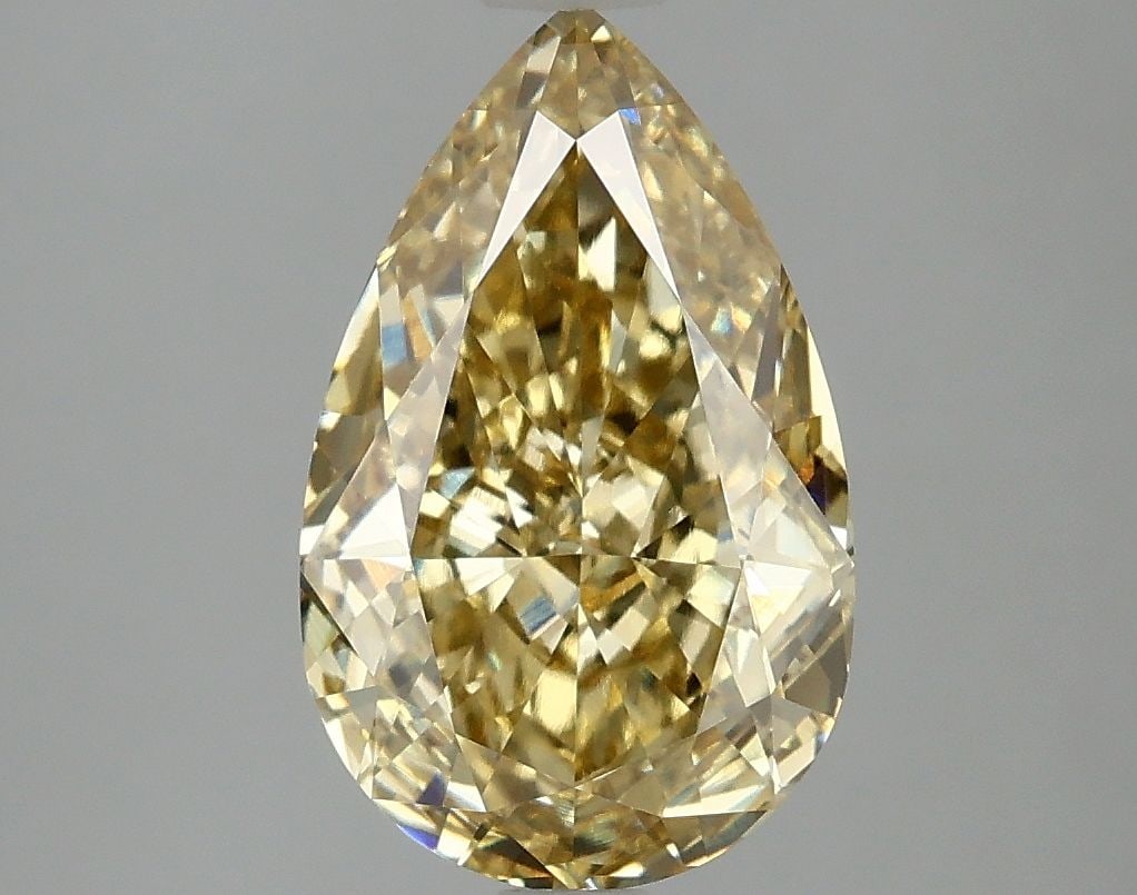 Loose Lab Diamond - IGI Pear 3.01ct Fancy Intense Yellow VVS2: Loose Lab Diamond - IGI Pear 3.01ct Fancy Intense Yellow VVS2 Experience the warmth and vibrancy of nature with this stunning 3.01ct Fancy Intense Yellow lab-grown diamond, boasting exceptional
