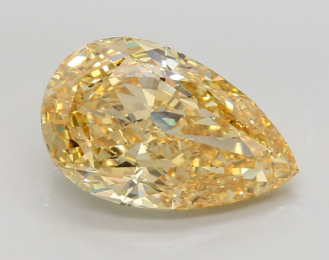 Loose Lab Diamond - IGI Pear 6.1ct Fancy Vivid Yellow VVS2: Loose Lab Diamond - IGI Pear 6.1ct Fancy Vivid Yellow VVS2 Experience the brilliance of a lab-grown diamond, certified by the International Gemological Institute (IGI) as Fancy Vivid Yellow with excep