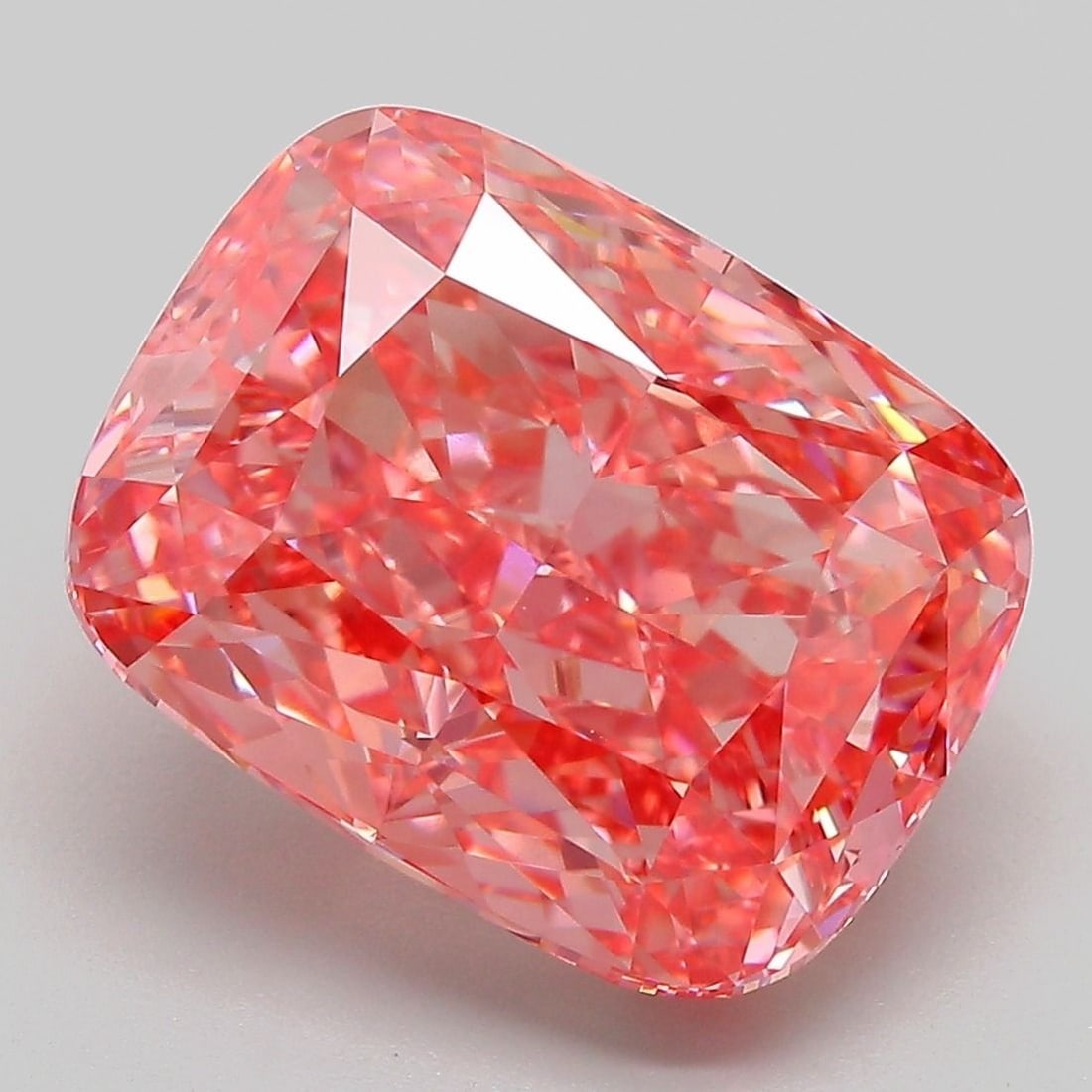 Vivid Pink VVS2 7.87ct Loose Lab Diamond Cushion Modified IGI: Vivid Pink VVS2 7.87ct Loose Lab Diamond Cushion Modified IGI Experience the rare beauty of a Fancy Vivid Pink diamond, one of the most coveted colors in the world of gemstones. This stunning 7.87ct V