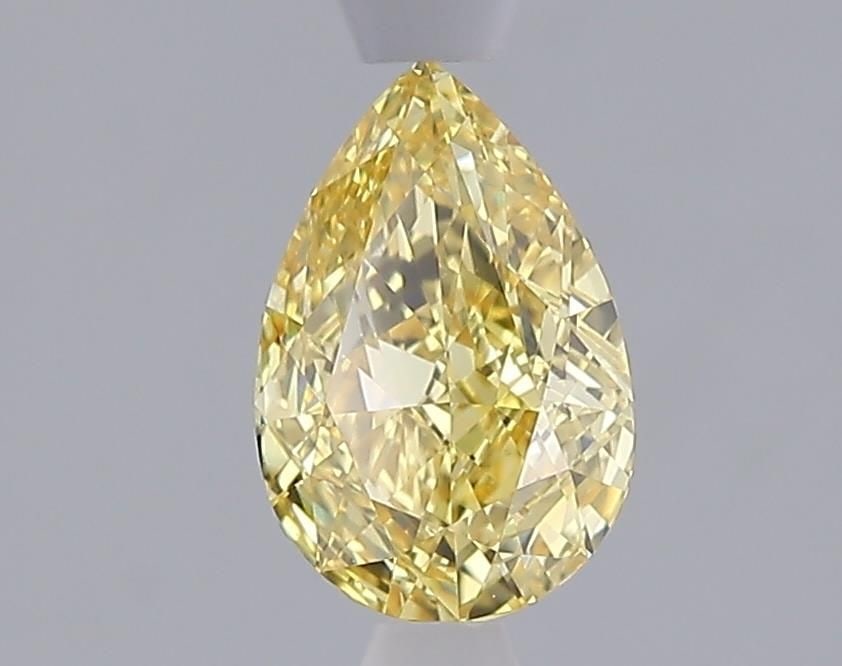 Loose Lab Diamond - IGI Pear 1.1ct Fancy Vivid Yellow VVS2: Loose Lab Diamond - IGI Pear 1.1ct Fancy Vivid Yellow VVS2 Experience the brilliance of nature's own sunshine with this stunning 1.1ct Fancy Vivid Yellow lab diamond, certified by IGI and boasting an