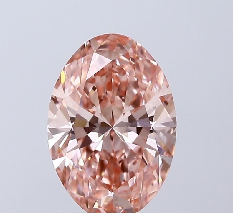 IGI Oval 1.58ct Fancy Vivid Pink VVS2 Loose Lab Diamond: IGI Oval 1.58ct Fancy Vivid Pink VVS2 Loose Lab Diamond Experience the unparalleled beauty of a lab-grown diamond, certified by IGI as Fancy Vivid Pink with exceptional clarity and polish. This