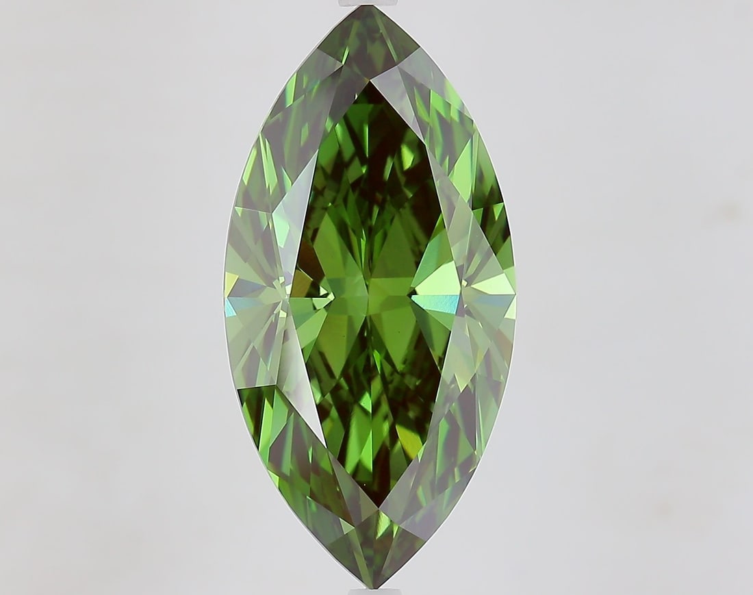 IGI Marquise 7.8ct Fancy Vivid Green VVS2 Loose Lab Diamond: IGI Marquise 7.8ct Fancy Vivid Green VVS2 Loose Lab Diamond Experience the rare beauty of a Fancy Vivid Green lab-grown diamond, boasting exceptional clarity and polish in its 7.8ct marquise cut. Cert