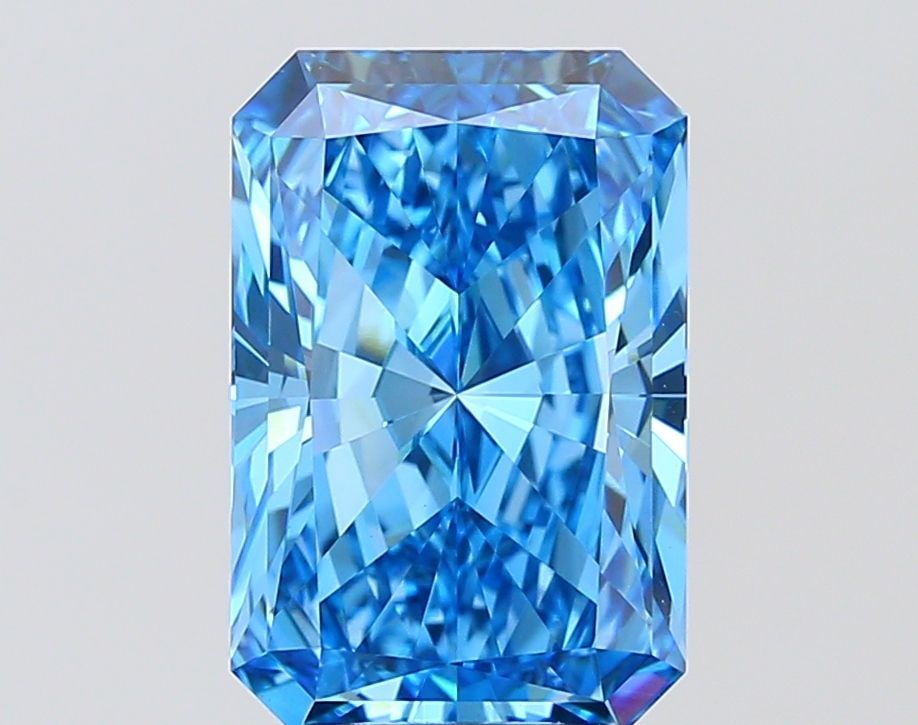 IGI Radiant 5.03ct Fancy Vivid Blue VVS2 Loose Lab Diamond: IGI Radiant 5.03ct Fancy Vivid Blue VVS2 Loose Lab Diamond Experience the rare beauty of a Fancy Vivid Blue diamond, one of the most striking and coveted colors in the world of gemstones. This