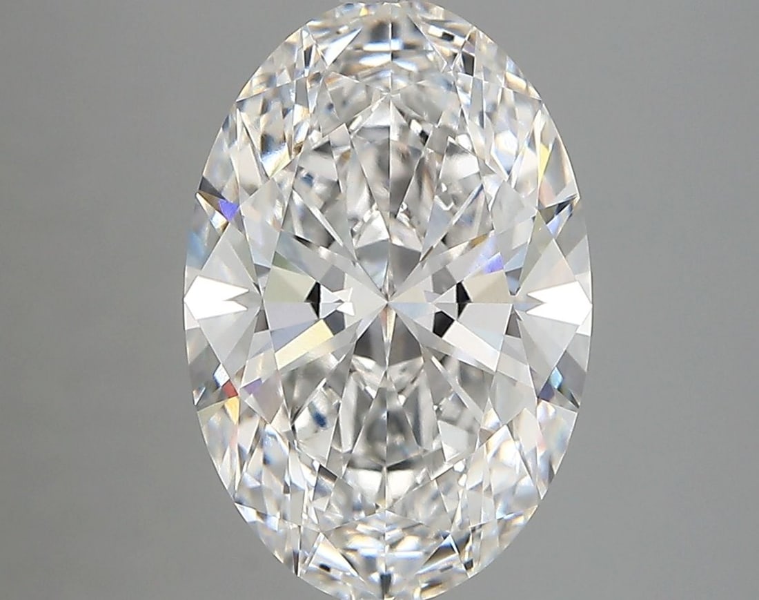 IGI Oval 3.7ct E VVS2 Loose Lab Diamond: IGI Oval 3.7ct E VVS2 Loose Lab Diamond A stunning IGI Oval lab diamond, certified E in color and VVS2 clarity, boasts exceptional cut quality with EX polish and symmetry. Weighing 3.7 carats, this ra