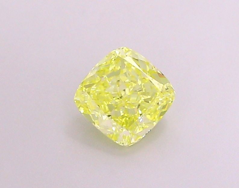 Loose Lab Diamond - IGI Cushion Modified 1.12ct Fancy Vivid Yellow VVS2: Loose Lab Diamond - IGI Cushion Modified 1.12ct Fancy Vivid Yellow VVS2 A rare and radiant gem, this 1.12ct Fancy Vivid Yellow Lab diamond boasts exceptional clarity (VVS2) and polish (EX), giving it