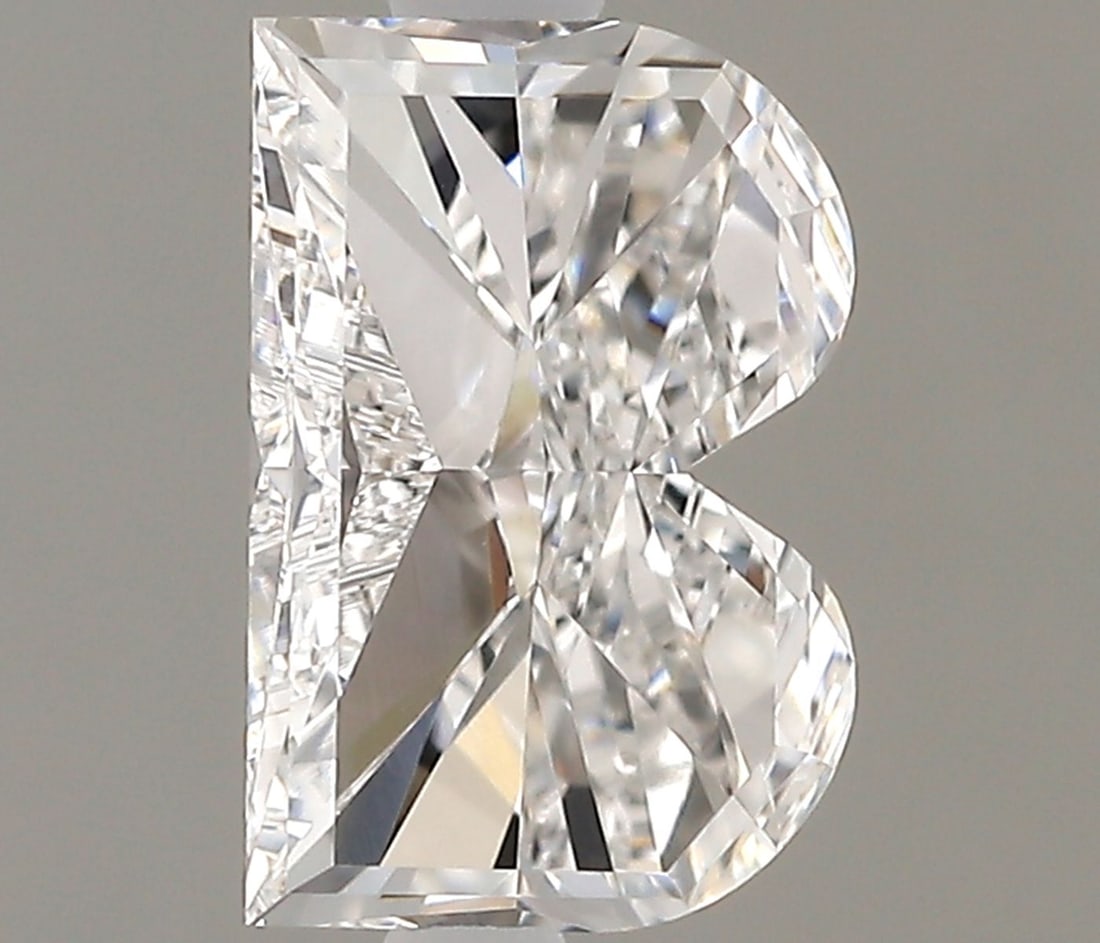 0.66ct E VVS2 Loose Lab Diamond: 0.66ct E VVS2 Loose Lab Diamond Experience the beauty of a lab-grown diamond, expertly cut to maximize its fire and brilliance. This exceptional 0.66ct E VVS2 diamond boasts impressive clarity and col