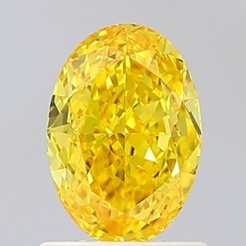 IGI Oval 1.17ct Fancy Vivid Yellow VVS2 Loose Lab Diamond: IGI Oval 1.17ct Fancy Vivid Yellow VVS2 Loose Lab Diamond Experience the brilliance of nature in this stunning 1.17ct Fancy Vivid Yellow VVS2 loose lab diamond, boasting exceptional clarity and color