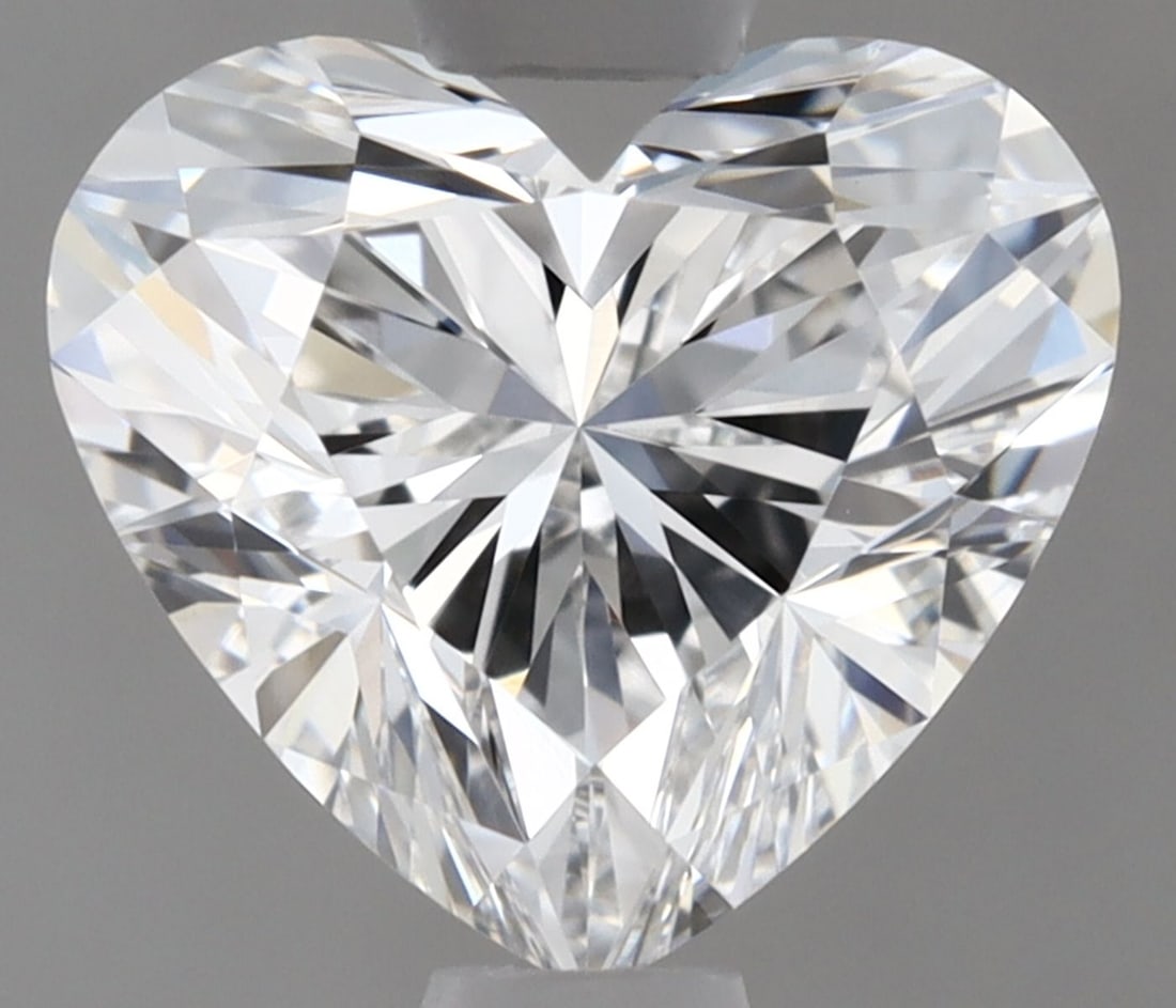 IGI Heart 0.97ct E VVS2 Loose Lab Diamond: IGI Heart 0.97ct E VVS2 Loose Lab Diamond A rare and exceptional find, this 0.97ct IGI Heart lab diamond boasts an impressive EX symmetry and EX polish, giving it a radiant appearance. Certified as