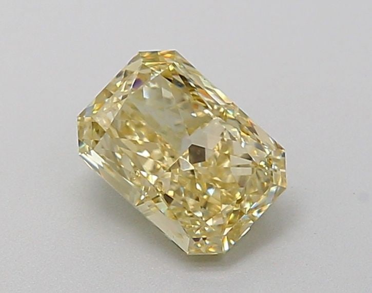 IGI Radiant 1.11ct Fancy Yellow VVS2 Loose Lab Diamond: IGI Radiant 1.11ct Fancy Yellow VVS2 Loose Lab Diamond Experience the unique beauty of a Fancy Yellow diamond, one of the rarest and most coveted colors in nature. This 1.11ct IGI-certified lab-grown