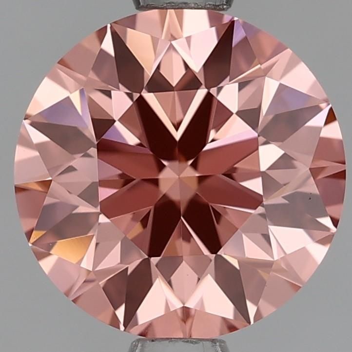 Loose Lab Diamond - Round 1.55ct Fancy Orangey Pink VVS2: Loose Lab Diamond - Round 1.55ct Fancy Orangey Pink VVS2 Experience the vibrant beauty of a lab-grown diamond, boasting an exceptional 1.55ct Fancy Orangey Pink hue that's truly one-of-a-kind. This