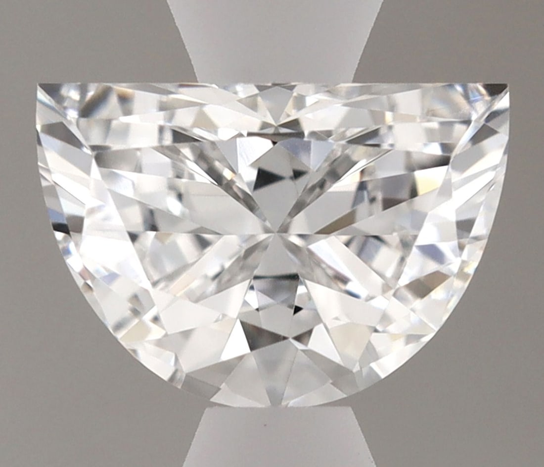 Half Moon 0.44ct D VVS2 Diamond: Half Moon 0.44ct D VVS2 Diamond Experience the brilliance of a lab-grown diamond, certified VVS2 in clarity and D in color, making it one of the finest diamonds available. This stunning half moon cut