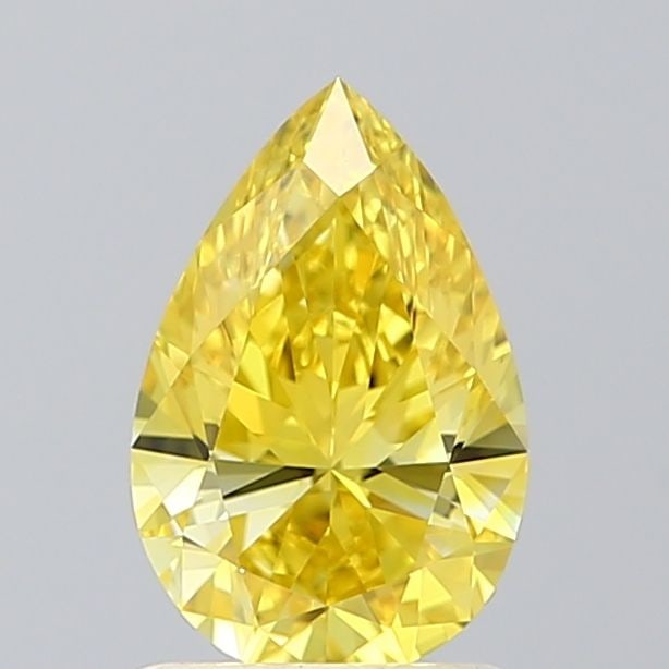 Loose Lab Diamond - IGI Pear 1.1ct Fancy Vivid Yellow VVS1: Loose Lab Diamond - IGI Pear 1.1ct Fancy Vivid Yellow VVS1 A truly unique and radiant gem, this 1.1ct Fancy Vivid Yellow Lab diamond boasts an exceptional VVS1 clarity and EX polish, giving it a