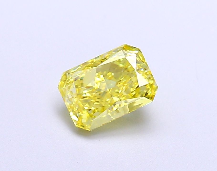 IGI Radiant 1.08ct Fancy Vivid Yellow VVS1 Loose Lab Diamond: IGI Radiant 1.08ct Fancy Vivid Yellow VVS1 Loose Lab Diamond Experience the brilliance of nature's own sunshine with this stunning 1.08ct Fancy Vivid Yellow VVS1 lab-grown diamond, certified by IGI an