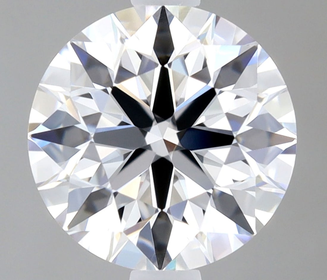Round 0.96ct D VVS1 Loose Lab Diamond: Round 0.96ct D VVS1 Loose Lab Diamond Experience the brilliance of a truly unique gemstone - this exceptional 0.96ct D VVS1 lab diamond boasts an EX cut, polish, and symmetry, giving it a radiant