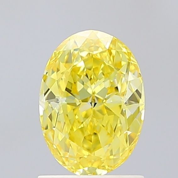 IGI Oval 1.51ct Fancy Vivid Yellow VVS2 Loose Lab Diamond: IGI Oval 1.51ct Fancy Vivid Yellow VVS2 Loose Lab Diamond A true gem for the discerning collector, this 1.51ct Fancy Vivid Yellow VVS2 loose lab diamond boasts exceptional clarity and color, making it