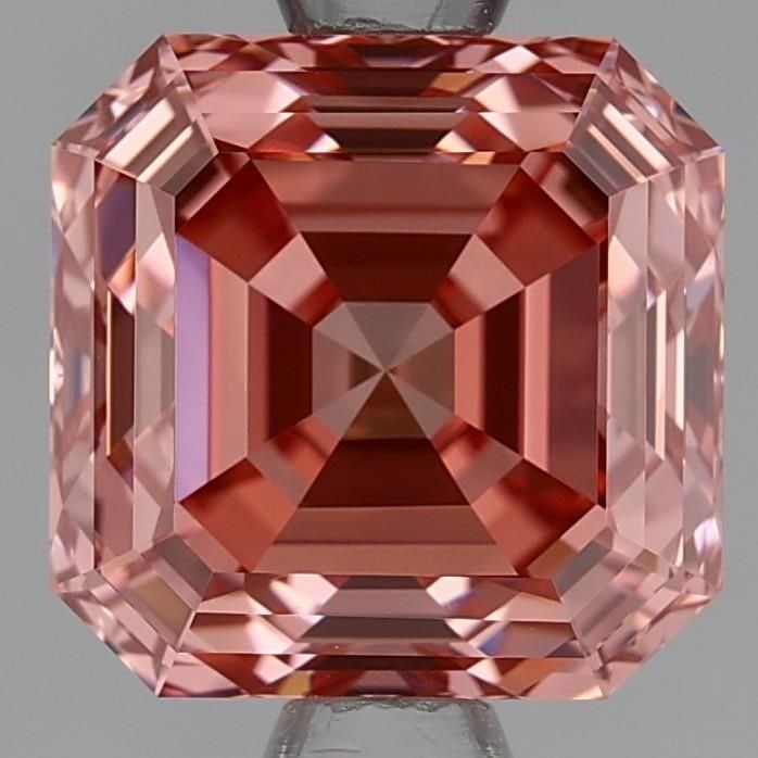 Fancy Orangey Pink VVS2 1.84ct Loose Lab Emerald: Fancy Orangey Pink VVS2 1.84ct Loose Lab Emerald Experience the vibrant beauty of a lab-grown emerald, boasting an extraordinary Fancy Orangey Pink hue and exceptional clarity of VVS2. This stunning