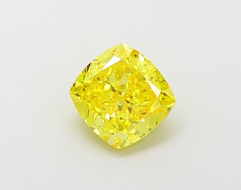Loose Lab Diamond - IGI Cushion Modified 1.08ct Fancy Vivid Yellow VVS1: Loose Lab Diamond - IGI Cushion Modified 1.08ct Fancy Vivid Yellow VVS1 Experience the brilliance of nature's own sunshine with this stunning 1.08ct Fancy Vivid Yellow Lab diamond, certified by the In