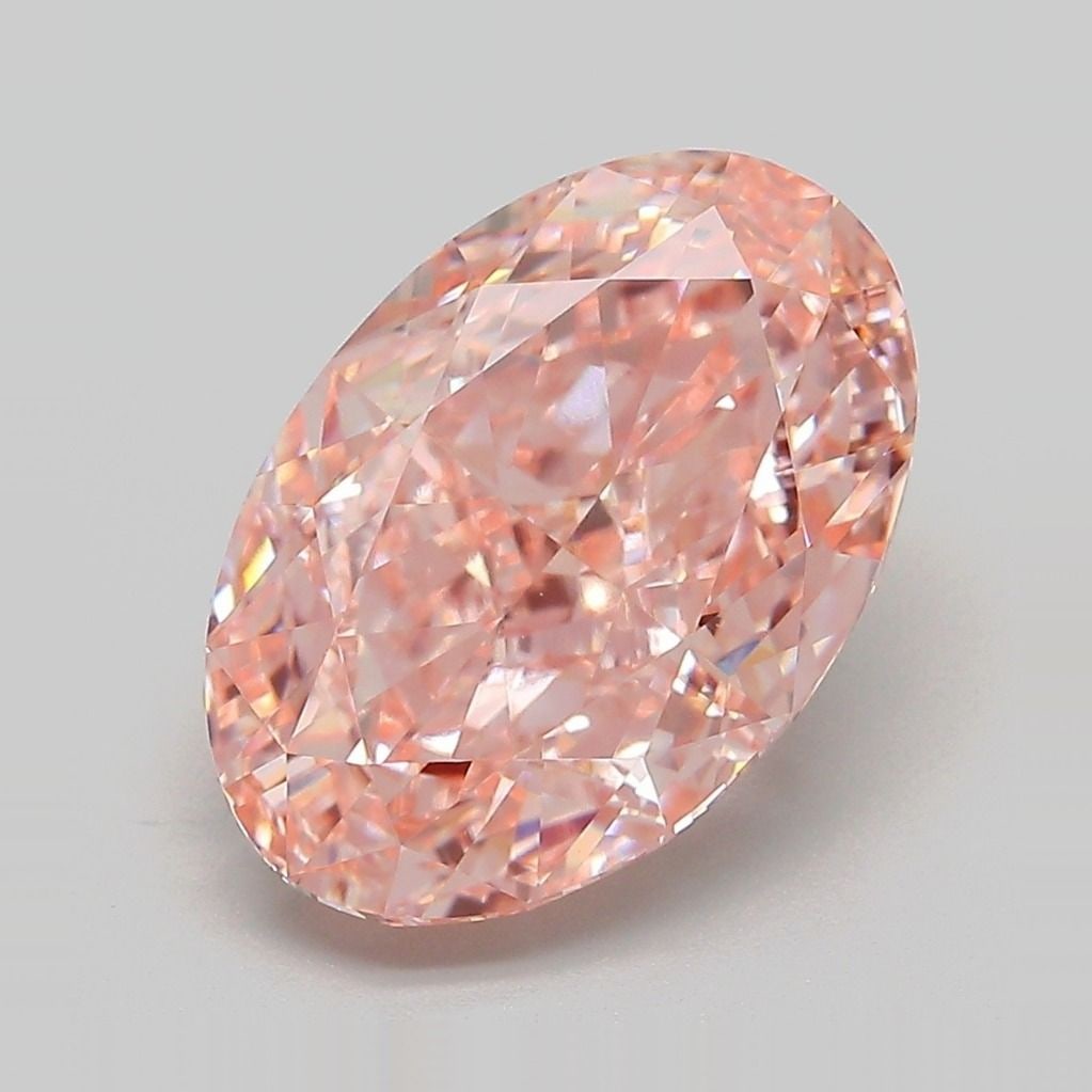 IGI Oval 5.53ct Fancy Vivid Pink VVS2 Loose Lab Diamond: IGI Oval 5.53ct Fancy Vivid Pink VVS2 Loose Lab Diamond Experience the rare beauty of a Fancy Vivid Pink diamond, one of the most coveted colors in the world of gemstones. This stunning 5.53ct lab-gro
