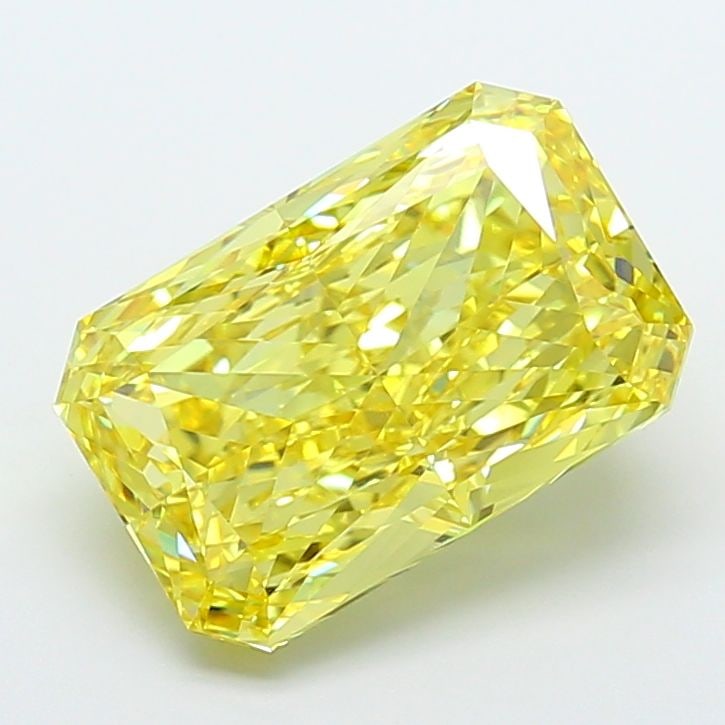 IGI Radiant 9.09ct Fancy Vivid Yellow VVS2 Loose Lab Diamond: IGI Radiant 9.09ct Fancy Vivid Yellow VVS2 Loose Lab Diamond Experience the vibrant beauty of nature in this stunning 9.09ct Fancy Vivid Yellow VVS2 loose lab diamond, certified by IGI and boasting ex