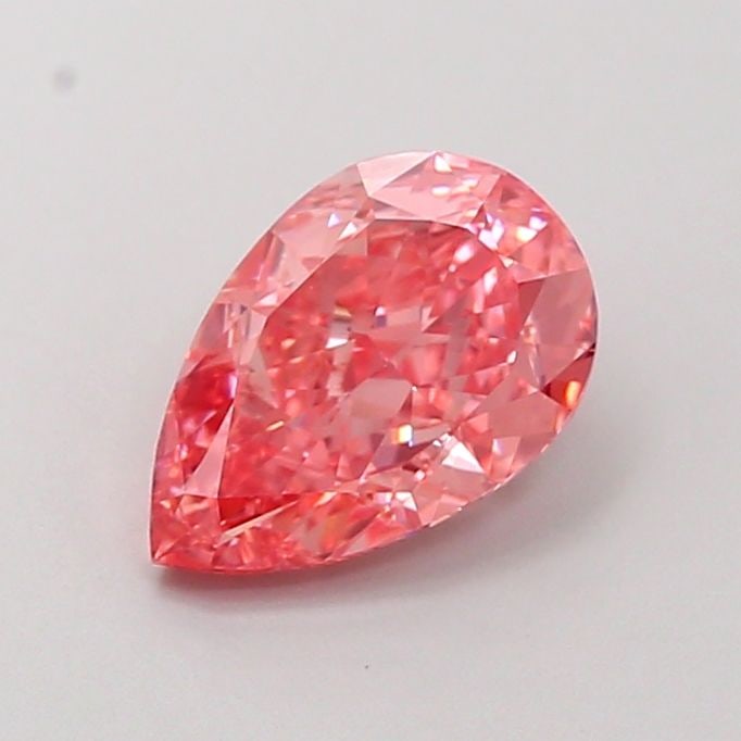 Loose Lab Diamond - IGI Pear 1.55ct Fancy Vivid Pink VVS1: Loose Lab Diamond - IGI Pear 1.55ct Fancy Vivid Pink VVS1 Experience the unparalleled beauty of this exquisite lab-grown diamond, boasting a vibrant Fancy Vivid Pink hue and exceptional clarity as cer
