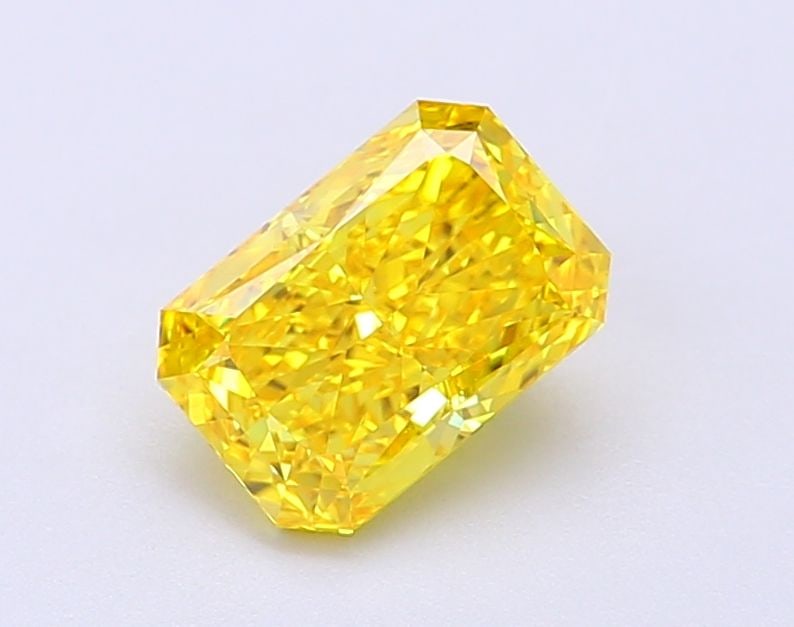 IGI Radiant 1.2ct Fancy Vivid Yellow VVS2 Loose Lab Diamond: IGI Radiant 1.2ct Fancy Vivid Yellow VVS2 Loose Lab Diamond Experience the vibrant beauty of a lab-grown Fancy Vivid Yellow diamond, certified by IGI as VVS2 in clarity and EX in polish and symmetry.