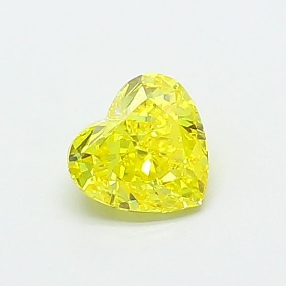 IGI Heart 0.56ct Fancy Vivid Yellow VVS2 Loose Lab Diamond: IGI Heart 0.56ct Fancy Vivid Yellow VVS2 Loose Lab Diamond Experience the brilliance of nature's own sunshine with this stunning 0.56ct Fancy Vivid Yellow VVS2 loose lab diamond, certified by the Inte
