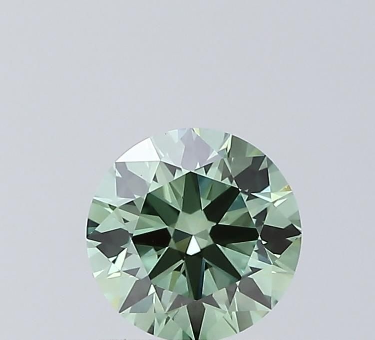 Loose Lab Diamond - IGI Round 1.07ct Fancy Vivid Green VVS2: Loose Lab Diamond - IGI Round 1.07ct Fancy Vivid Green VVS2 Experience the breathtaking beauty of a lab-grown diamond, certified by IGI as Fancy Vivid Green in VVS2 clarity. This exceptional 1.07ct st
