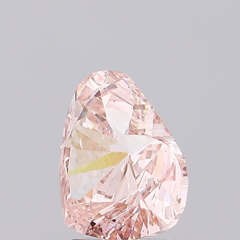IGI Heart 2.58ct Fancy Intense Pink VVS2 Loose Lab Diamond: IGI Heart 2.58ct Fancy Intense Pink VVS2 Loose Lab Diamond Experience the rare beauty of a Fancy Intense Pink diamond, one of the most coveted colors in the world of gemstones. This stunning 2.58ct la
