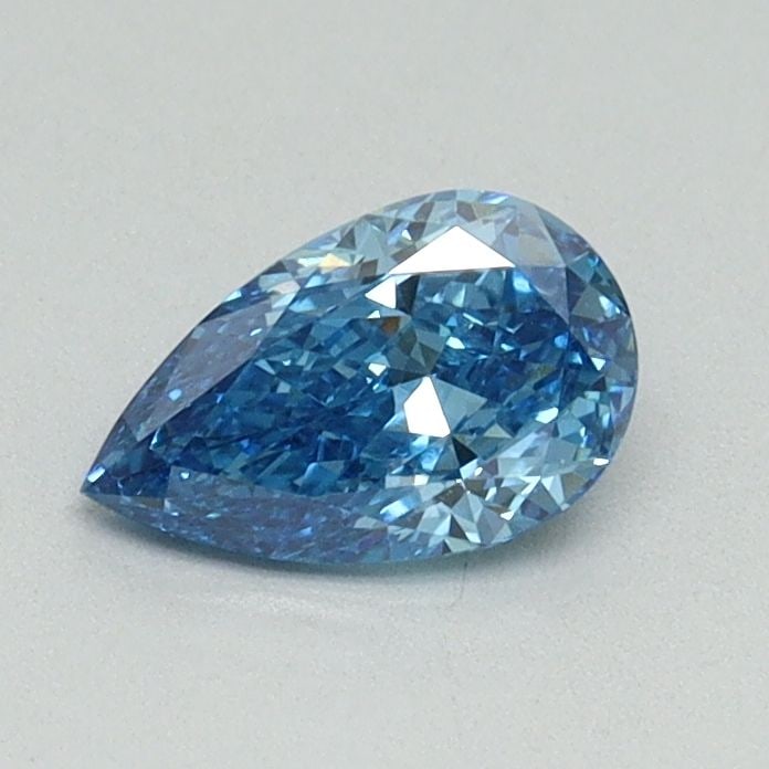 Loose Lab Diamond - IGI Pear 0.53ct Fancy Vivid Blue VVS2: Loose Lab Diamond - IGI Pear 0.53ct Fancy Vivid Blue VVS2 Experience the breathtaking beauty of a lab-grown diamond, certified by the International Gemological Institute (IGI) as Fancy Vivid Blue, wit