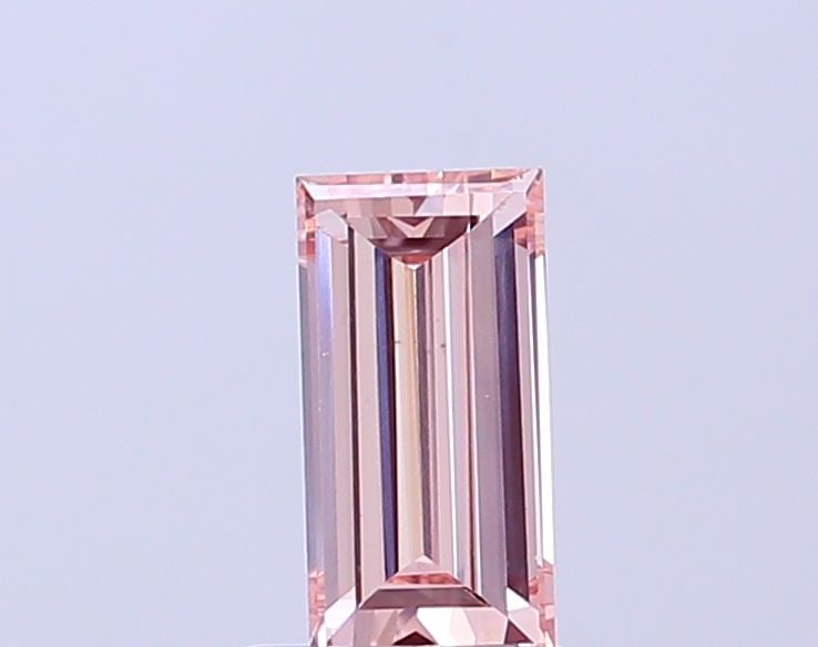 IGI Baguette 0.73ct Fancy Intense Pink VVS2 Loose Lab Diamond: IGI Baguette 0.73ct Fancy Intense Pink VVS2 Loose Lab Diamond Experience the rare beauty of a Fancy Intense Pink diamond, one of the most coveted colors in diamonds. This stunning 0.73ct lab-grown gem