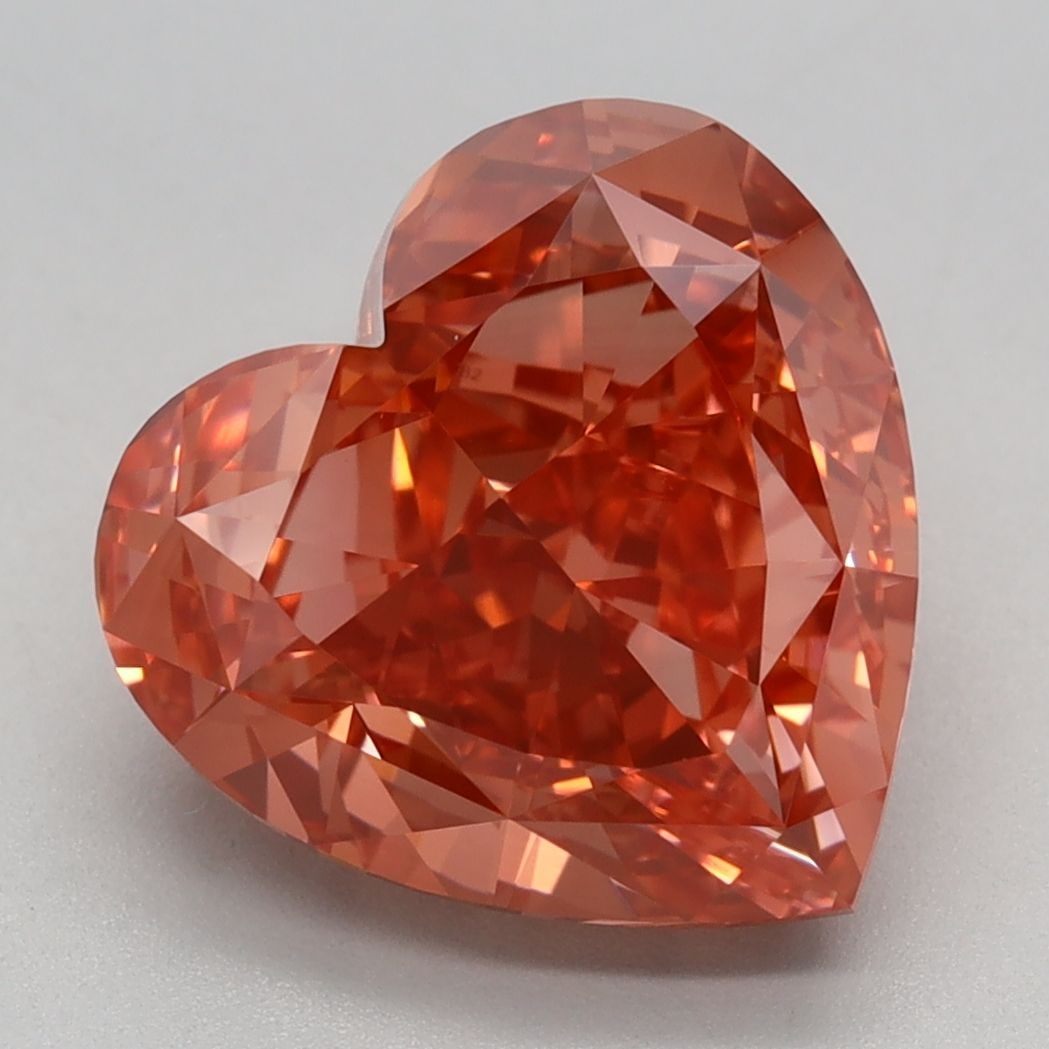 IGI Heart 4.27ct Fancy Vivid Pinkish Orange VVS2 Loose Lab Diamond: IGI Heart 4.27ct Fancy Vivid Pinkish Orange VVS2 Loose Lab Diamond Experience the breathtaking beauty of a lab-grown diamond, certified by IGI as Fancy Vivid Pinkish Orange in VVS2 clarity, boasting E