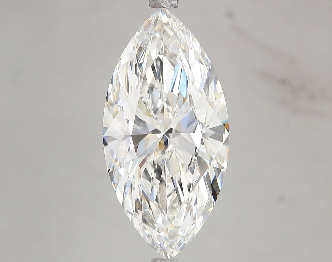 IGI Marquise 7.01ct G VVS2 Loose Lab Diamond: IGI Marquise 7.01ct G VVS2 Loose Lab Diamond Experience the exceptional beauty of this 7.01ct IGI Marquise lab-grown diamond, boasting an impressive G color and VVS2 clarity. With its EX polish and sy