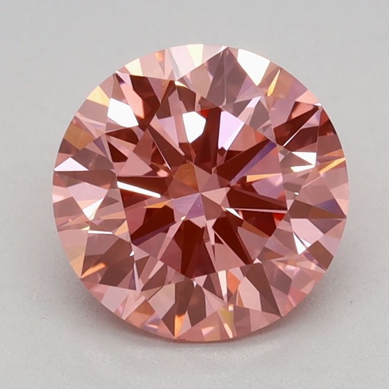 IGI Round 1.21ct Fancy Vivid Pink VVS2 Ideal Loose Lab Diamond: IGI Round 1.21ct Fancy Vivid Pink VVS2 Ideal Loose Lab Diamond Experience the breathtaking beauty of this 1.21ct Fancy Vivid Pink VVS2 Ideal Loose Lab Diamond, certified by the International Gemologic