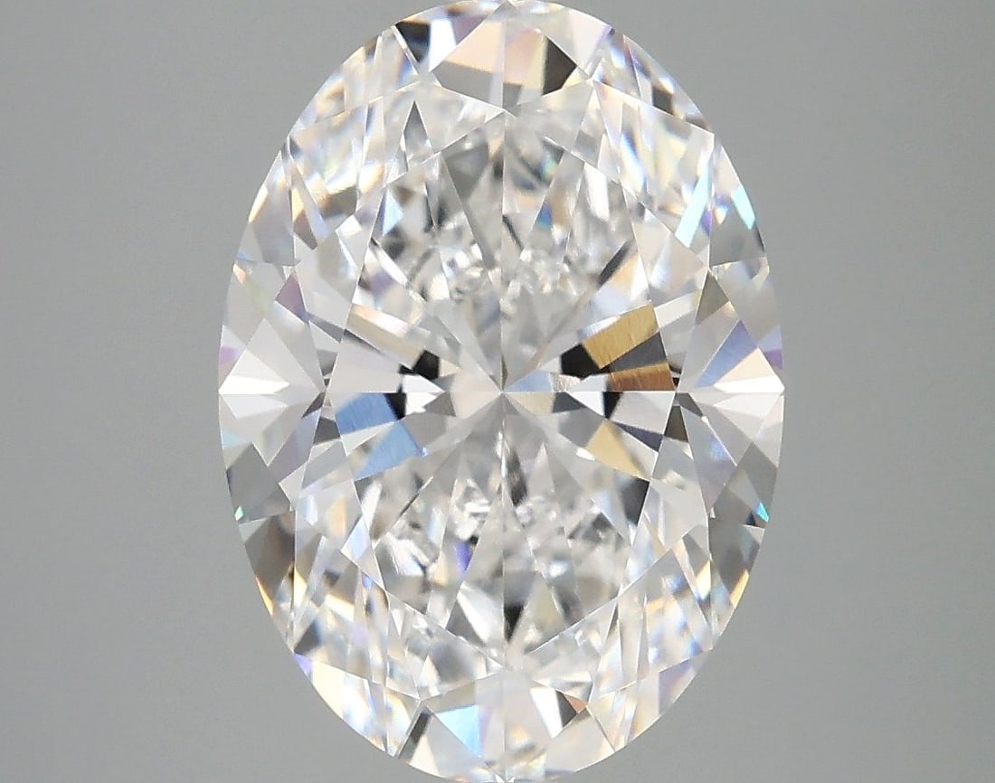 IGI Oval 5.07ct D VVS2 Loose Lab Diamond: IGI Oval 5.07ct D VVS2 Loose Lab Diamond A stunning IGI-certified lab-grown diamond, weighing 5.07 carats and boasting exceptional clarity with a VVS2 grade, this oval-cut gemstone shines with a brill