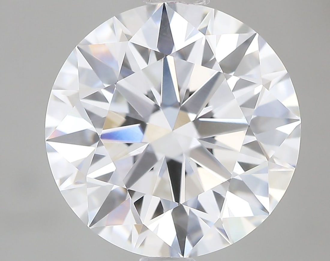 IGI Round 3.09ct E VVS2 Ideal Loose Lab Diamond: IGI Round 3.09ct E VVS2 Ideal Loose Lab Diamond Experience the brilliance of a lab-grown diamond, certified by IGI as a 3.09ct E VVS2 Ideal Round, boasting exceptional clarity and polish. This exquisi