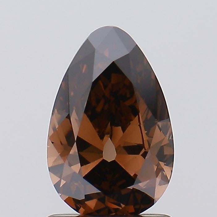 Loose Lab Diamond - IGI Pear 1.08ct Fancy Deep Brown VVS2: Loose Lab Diamond - IGI Pear 1.08ct Fancy Deep Brown VVS2 Experience the beauty of a lab-grown diamond, certified by the International Gemological Institute (IGI) as a Fancy Deep Brown VVS2. This stun