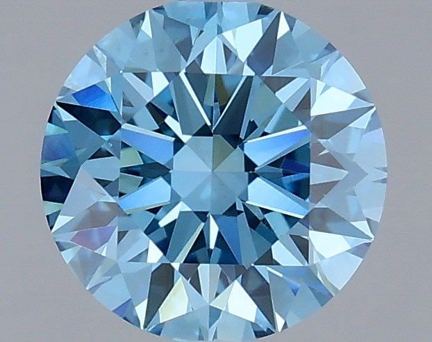 IGI Round 1.05ct Fancy Vivid Blue VVS2 Ideal Loose Lab Diamond: IGI Round 1.05ct Fancy Vivid Blue VVS2 Ideal Loose Lab Diamond Experience the breathtaking beauty of a Fancy Vivid Blue diamond, one of the rarest and most coveted colors in nature. This exquisite 1.0