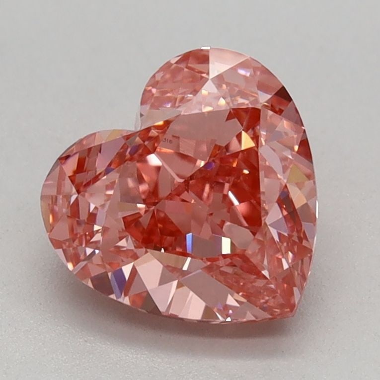 IGI Heart 1.36ct Fancy Vivid Pink VVS2 Loose Lab Diamond: IGI Heart 1.36ct Fancy Vivid Pink VVS2 Loose Lab Diamond Experience the rare beauty of a Fancy Vivid Pink diamond, one of the most coveted colors in the world of gemstones. This exquisite 1.36ct lab-g