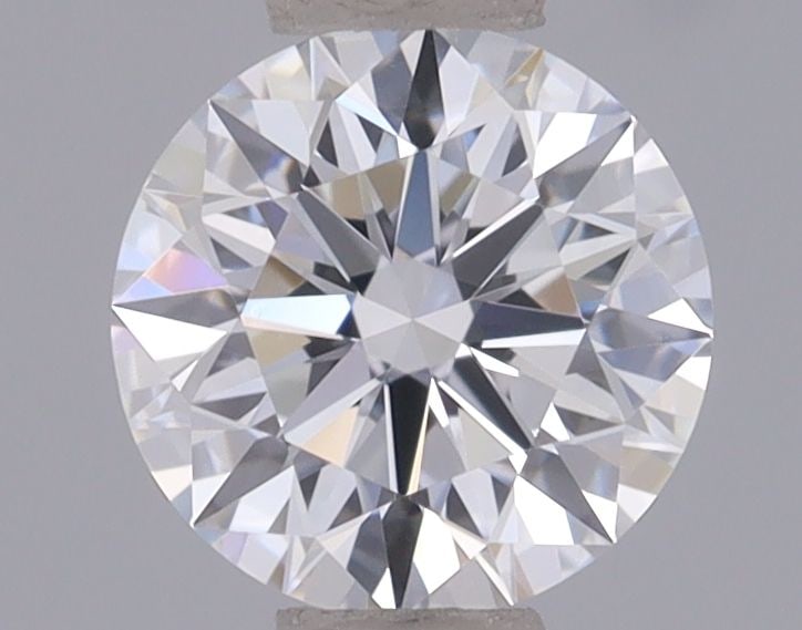 IGI Round 0.52ct D VVS1 Ideal Loose Lab Diamond: IGI Round 0.52ct D VVS1 Ideal Loose Lab Diamond A rare and exceptional lab-grown diamond, certified by the International Gemological Institute (IGI), boasts an impressive 0.52 carat cut with flawless